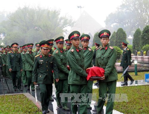 Truy điệu, an táng hài cốt liệt sĩ quân tình nguyện Việt Nam hy sinh tại Lào