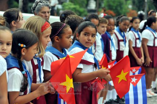 Hoạt động kỷ niệm 128 năm ngày sinh Chủ tịch Hồ Chí Minh của cộng đồng người Việt tại Lào và Cuba
