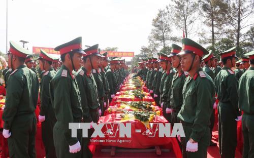 Tổ chức lễ truy điệu, an táng 98 hài cốt liệt sĩ hy sinh tại Lào