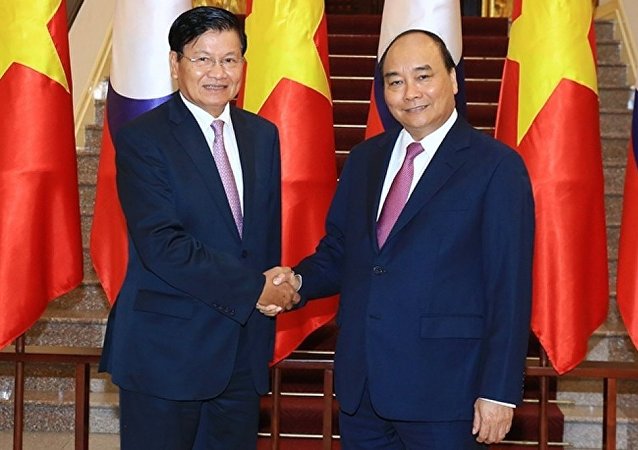 Việt Nam - Lào không ngừng tăng cường hợp tác an ninh, quốc phòng