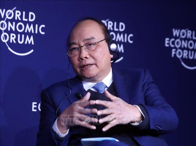 Thủ tướng đối thoại với Chủ tịch WEF về chủ đề Việt Nam và Thế giới