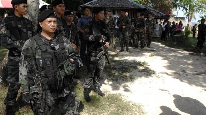 Philippines government troops kill 13 insurgents