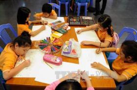 Over 100 children join painting contest on sea and islands