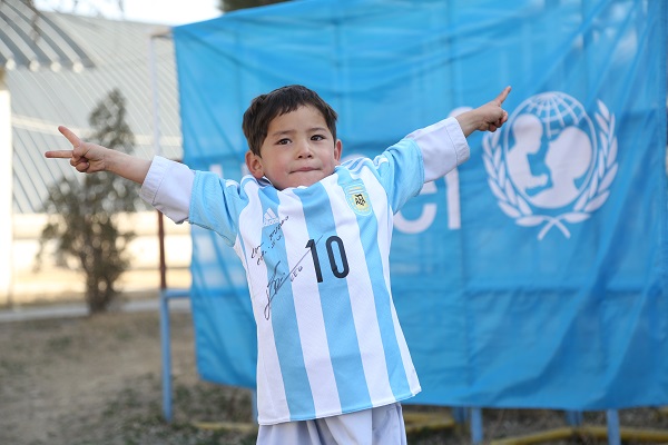 Murtaza receives signed soccer jerseys and ball donated by Lionel Messi