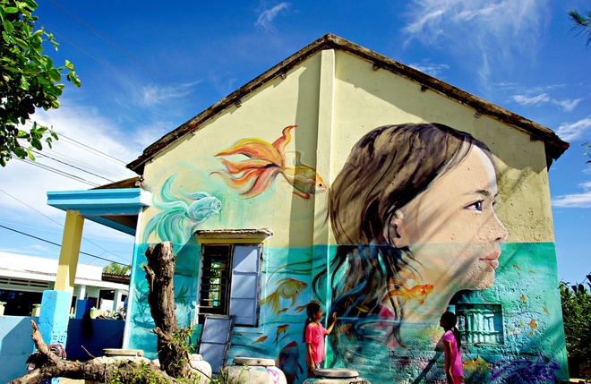 First village in Vietnam adopts public murals
