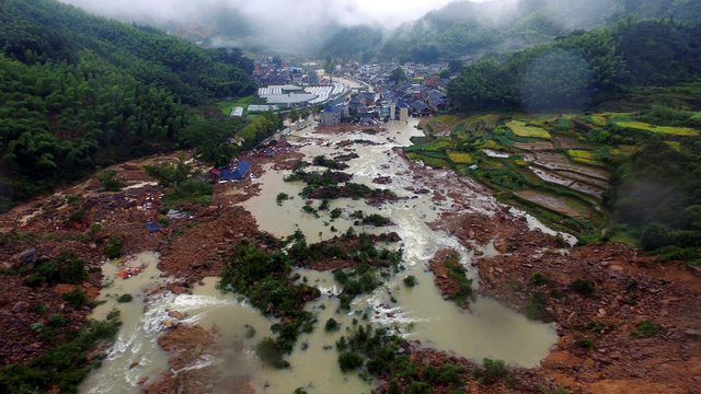 China landslide leaves at least 26 people missing