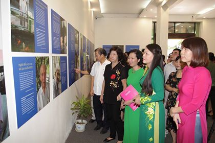 Photos on stories of elderly people on display in Hanoi