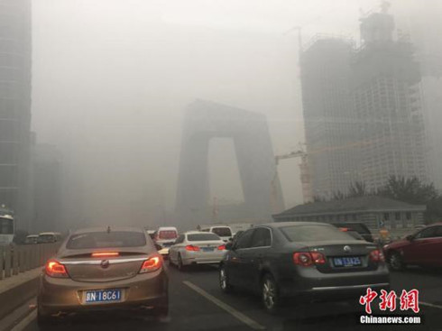 Beijing issues orange alert for heavy air pollution