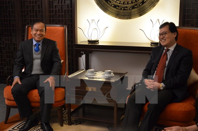 Traditional diplomatic exchanges between Vietnam and Laos in Geneva