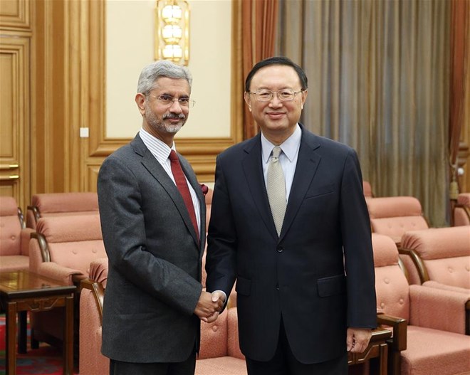 China, India pledge to promote bilateral relations