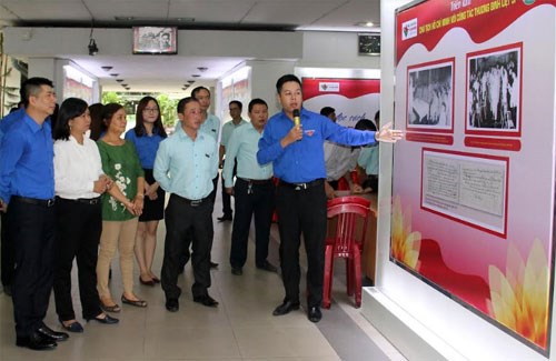 President Ho Chi Minh with wounded soldier and martyr affairs exhibited
