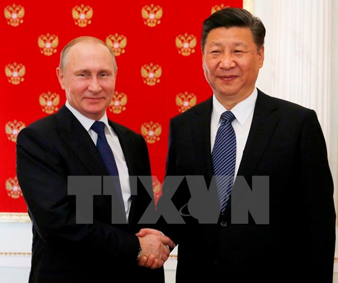 Vladimir Putin receives Chinese President