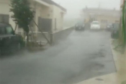 Tropical storm Talim batters Japan, thousands evacuate