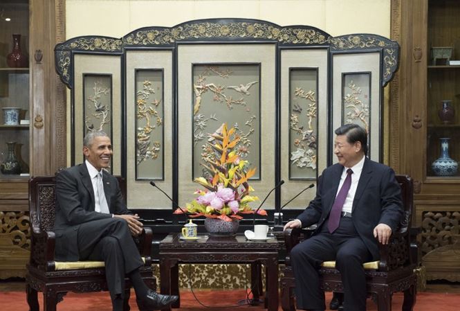 Chinese President Xi Jinping receives former US President Obama