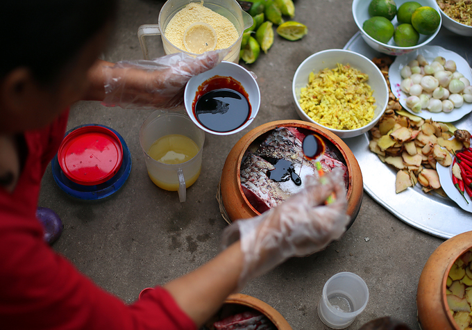 Village busy with cooking fish for Tet