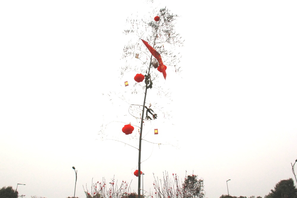 Erecting Neu pole at Vietnam National Village for Ethnic Culture and Tourism