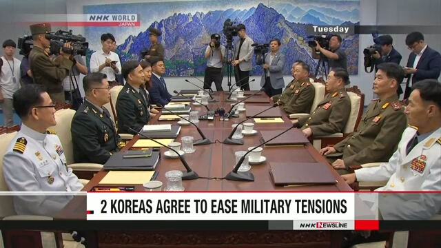 Two Koreas agree to ease military tensions
