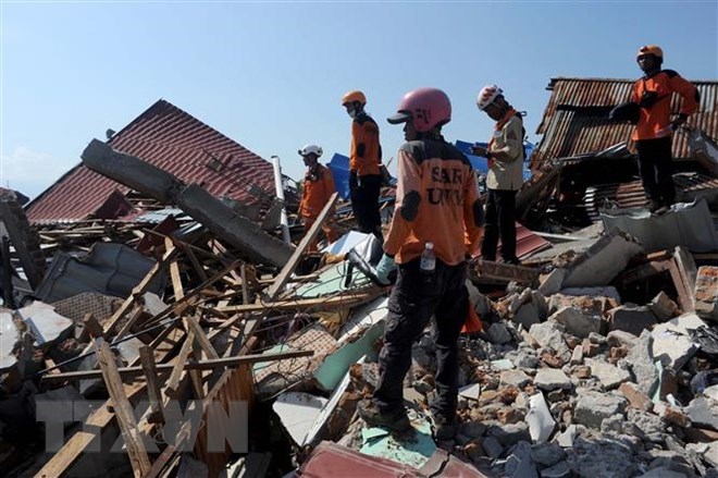 Indonesia Twin-disaster death toll soars to 2,04