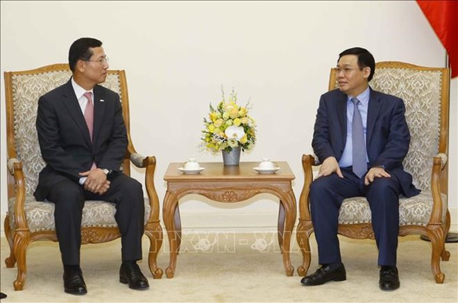 Deputy PM urges Shinhan Card to develop fintech in Vietnam
