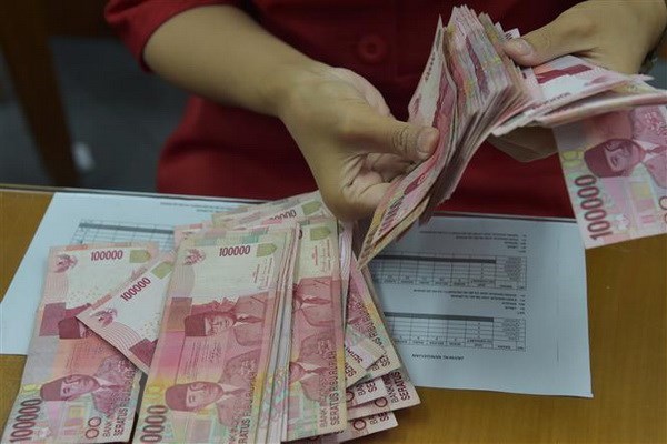 Pressure on rupiah not yet over in short term Minister