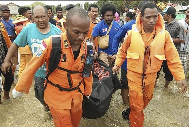At least 107 killed in Indonesia s flash floods, landslides