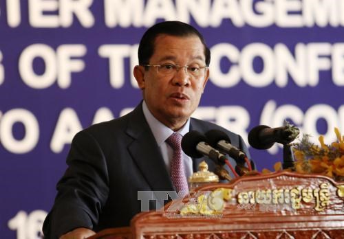 Cambodian peacekeepers equipped with armoured vehicles