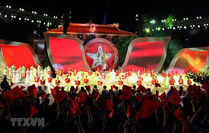 Singing on President Ho Chi Minh at ethnic culture village in Hanoi