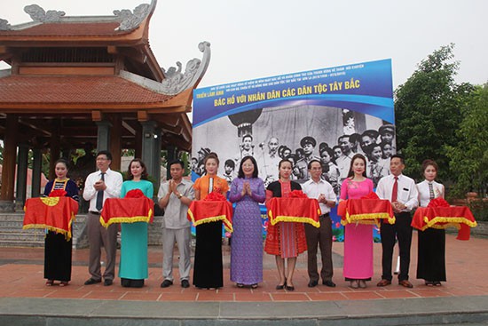 Photos of Uncle Ho and northwestern ethnic people on display