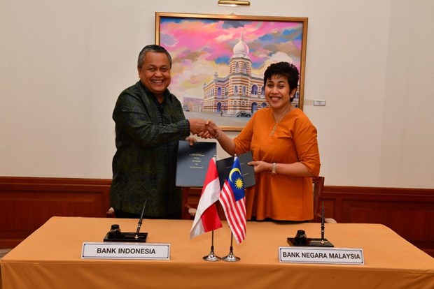 Malaysia, Indonesia sign USD-2-billion currency swap deal