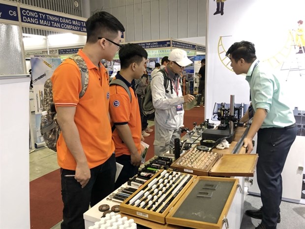 Int’l machinery, supporting industry fairs open in Ho Chi Minh City