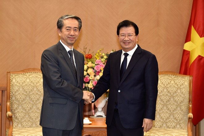 Deputy PM Trinh Dinh Dung hosts Chinese Ambassador
