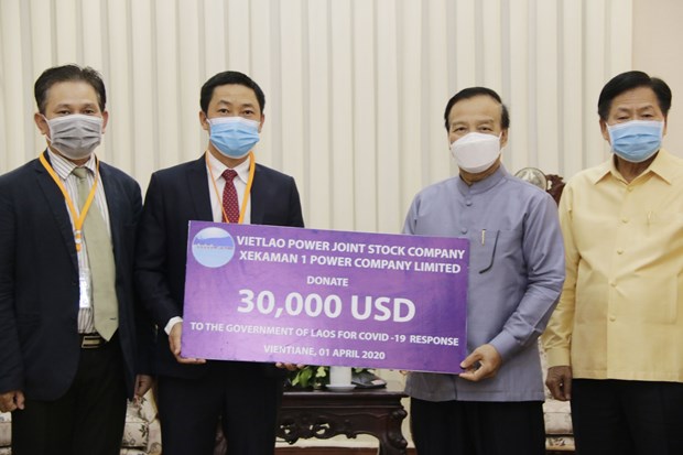 Vietnamese firm contributes to COVID-19 combat in Laos