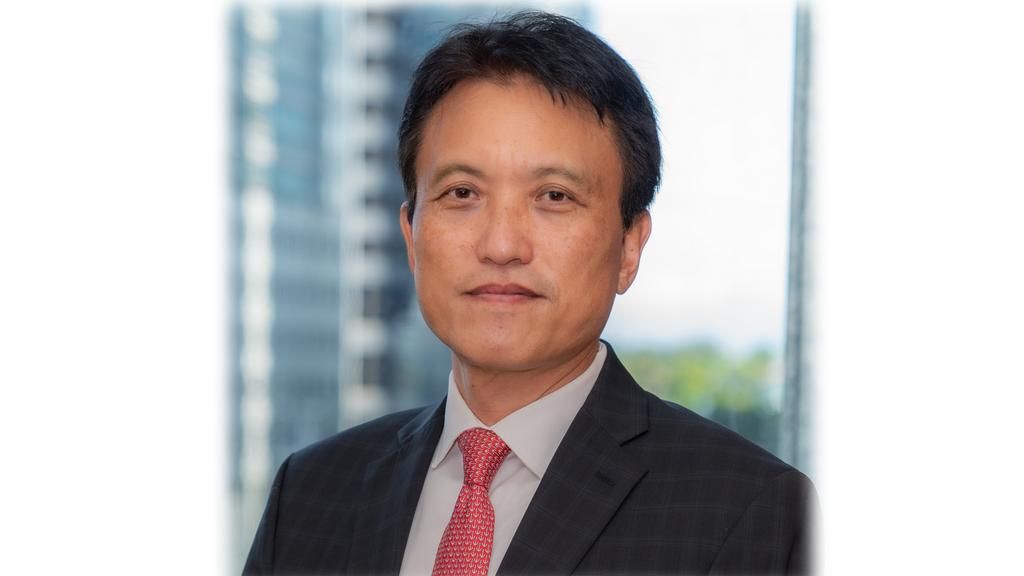 ADB Appoints Woochong Um as Managing Director General