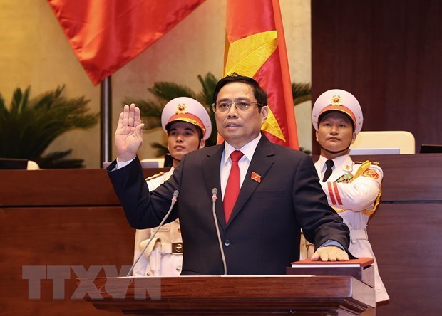 Prime Minister Pham Minh Chinh receives congratulation from Cambodian Government leader