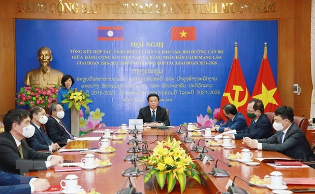 Vietnamese, Lao parties review theoretical exchange