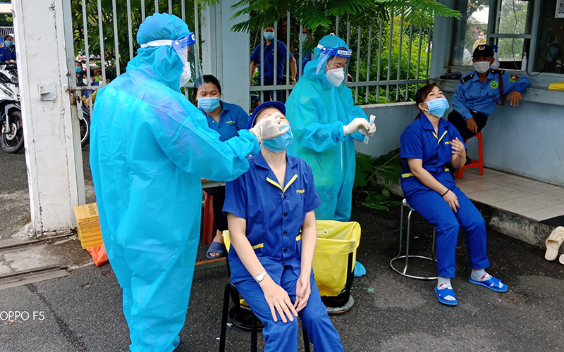 Workers in Ho Chi Minh City return to factories