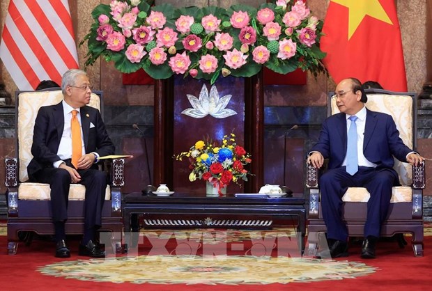 President suggests Vietnam, Malaysia take advantage of FTAs