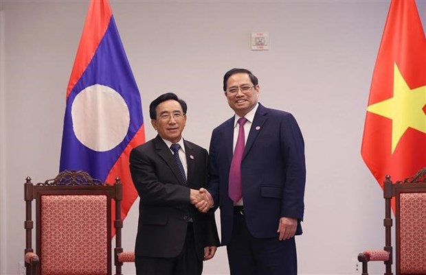 Prime Minister Pham Minh Chinh meets Lao counterpart in US