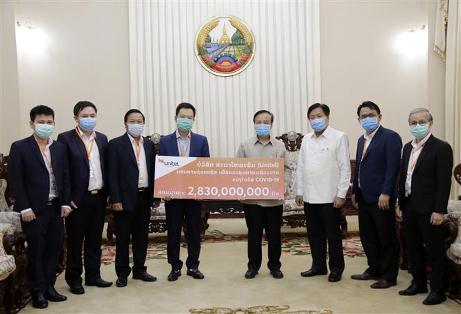 Coronavirus des entreprises vietnamiennes viennent en aide au Laos