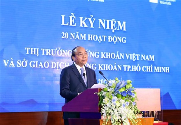 Le PM Nguyên Xuân Phuc sonne le gong pour les 20 ans du marché boursier