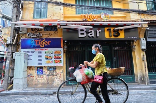 Hanoï ordonne la fermeture de bars, de salles de karaoké et d étals en bordure de route