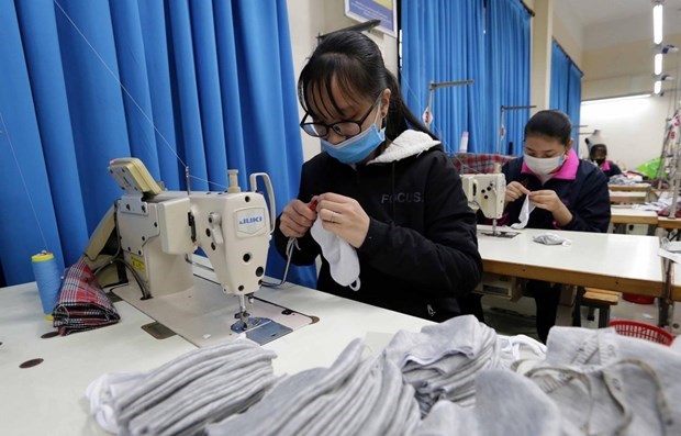 COVID-19 Standard Chartered soutient les entreprises fabriquant des équipements de protection
