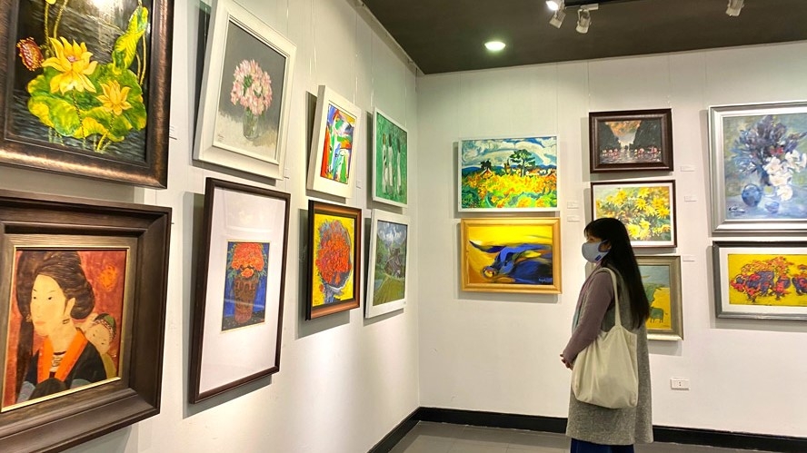 Une exposition de beaux-arts célèbre le Parti et le Nouvel An lunaire