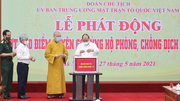 Le président Nguyên Xuân Phuc appelle à la force de la nation dans la lutte anti-COVID-19