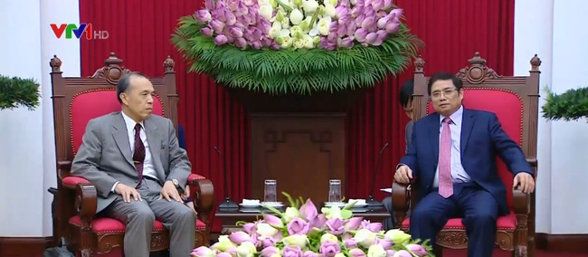 越共中央组织部部长范明正会见日本高级专家代表团