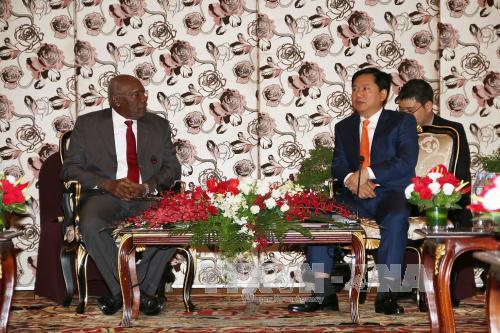 胡志明市市委书记丁罗升会见古巴共产党高级代表团