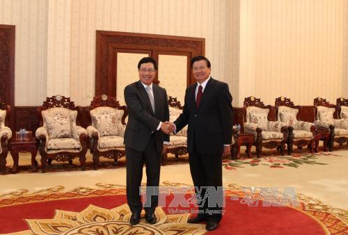 政府副总理兼外交部长范平明礼节性拜会老挝领导人