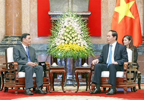 国家主席陈大光会见老挝国家主席办公室主任坎蒙• 蓬塔迪