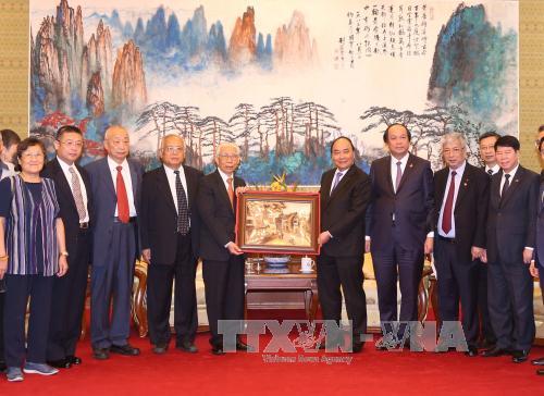 越南政府总理阮春福会见援越中国老顾问专家家属代表