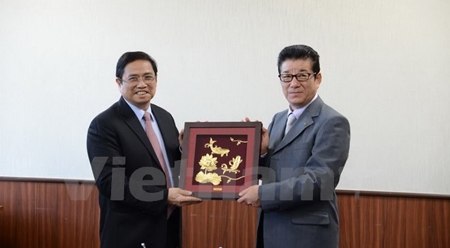 越共中央组织部部长范明正对日本进行工作访问